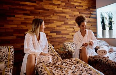 Young happy women enjoying in relaxing at wellness spa.